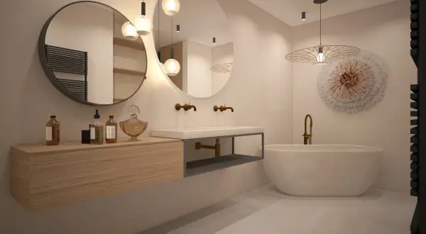 Salle de bain moderne avec baignoire îlot, double vasque et déco murale. Idéal pour estimer la durée des travaux salle de bain.